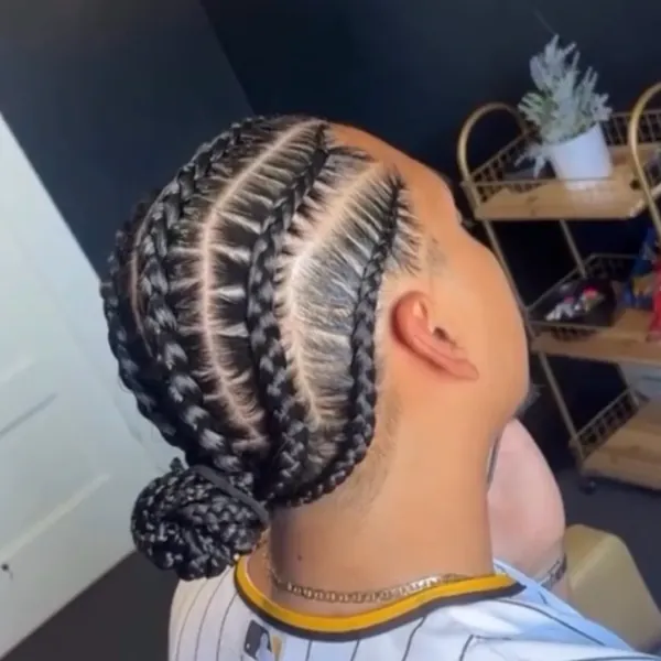 Six tight stitch braids with crisp parts running back from the hairline